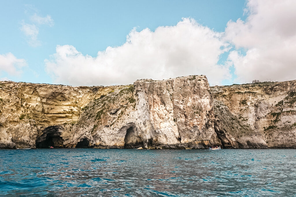 Overview of the seven caves near the Blue Grotto from the water with boat tour in Wied Iż-Żurrieq, Malta
