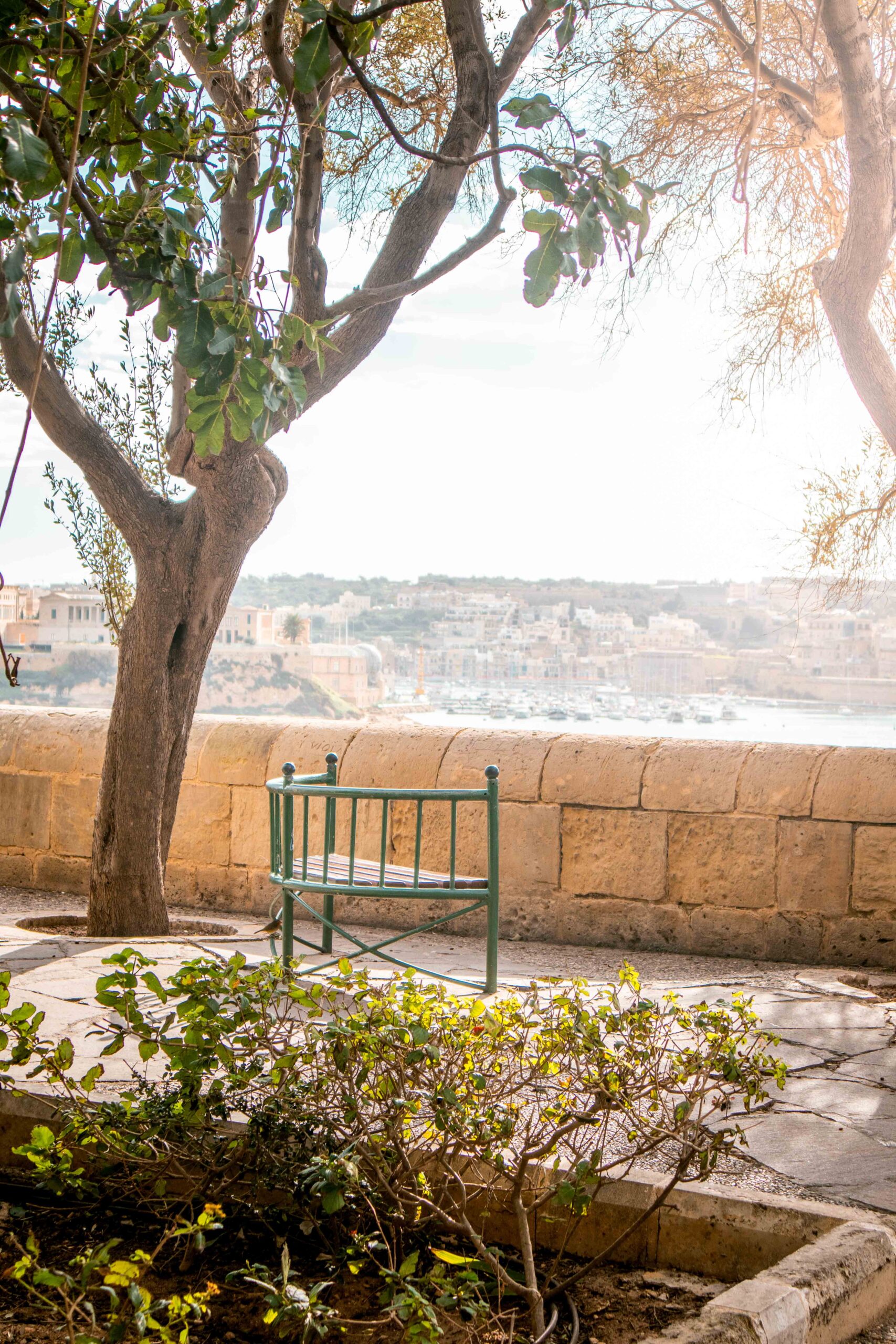 Bench overlooking Valletta Harbour in the Lower Barrakka Gardens in Valletta, Malta