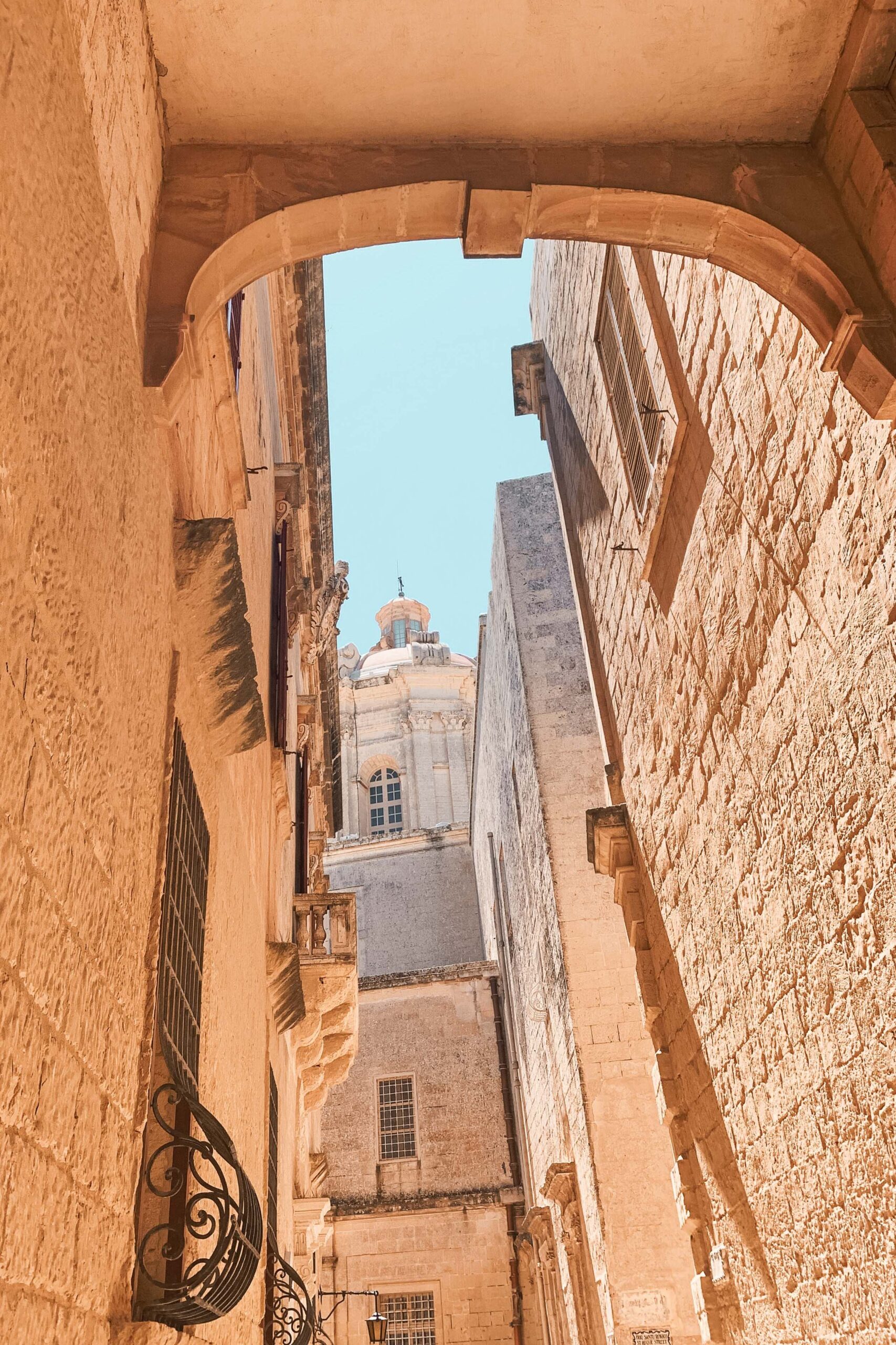 Narrow Saint Roque street (Triq Santu Rokku) in the old town of Mdina, Malta