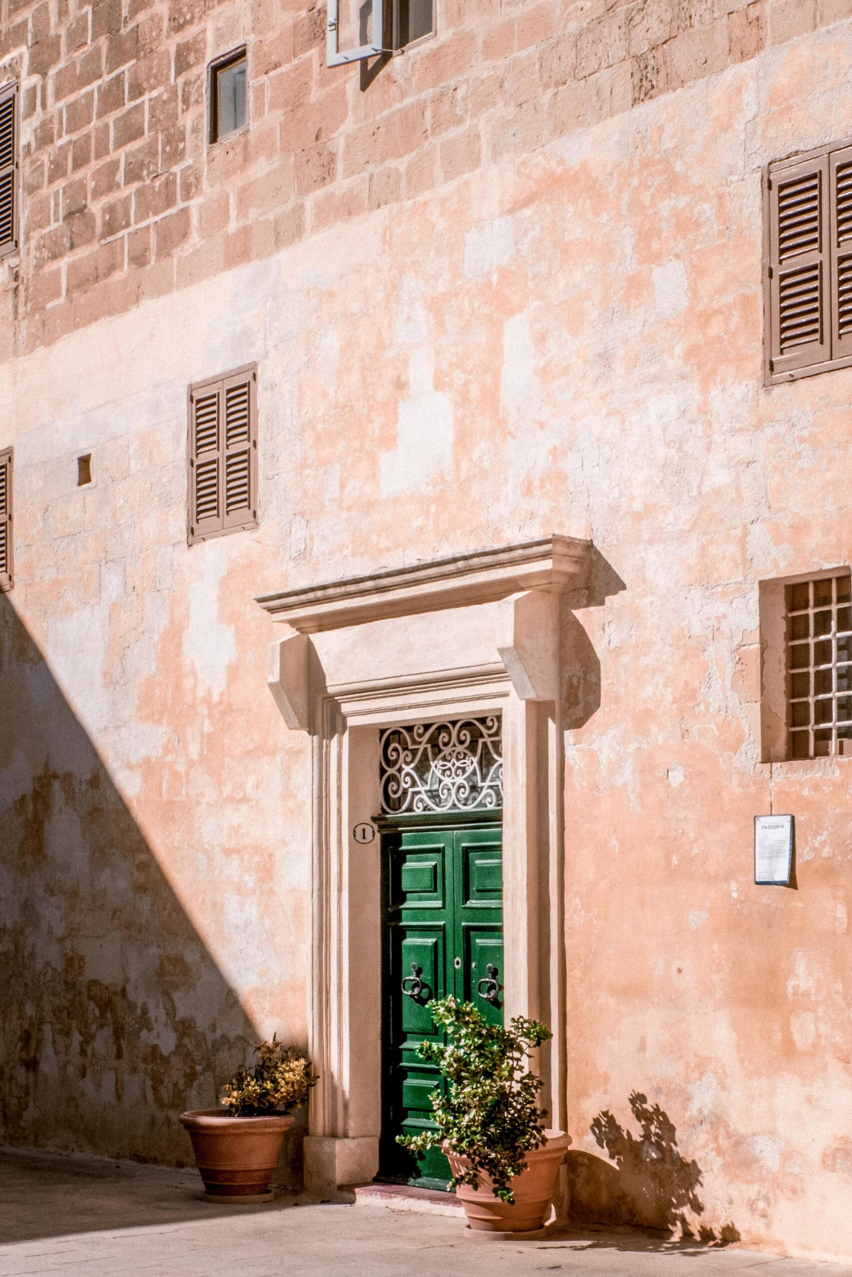 Green door in Triq San Nikola inside the old town of Mdina, Malta