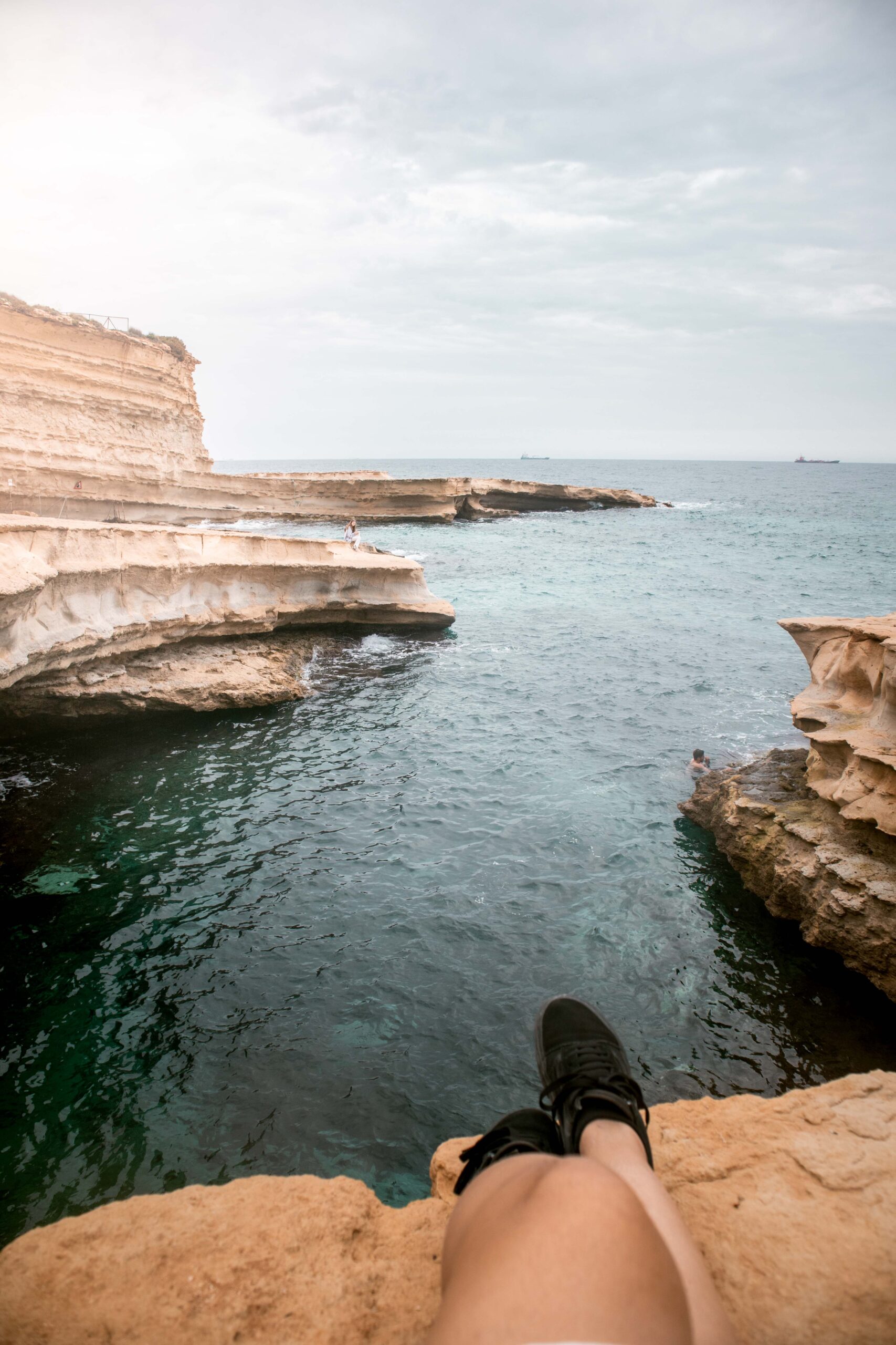 View of Saint Peter's Pool in Malta sitting at the edge