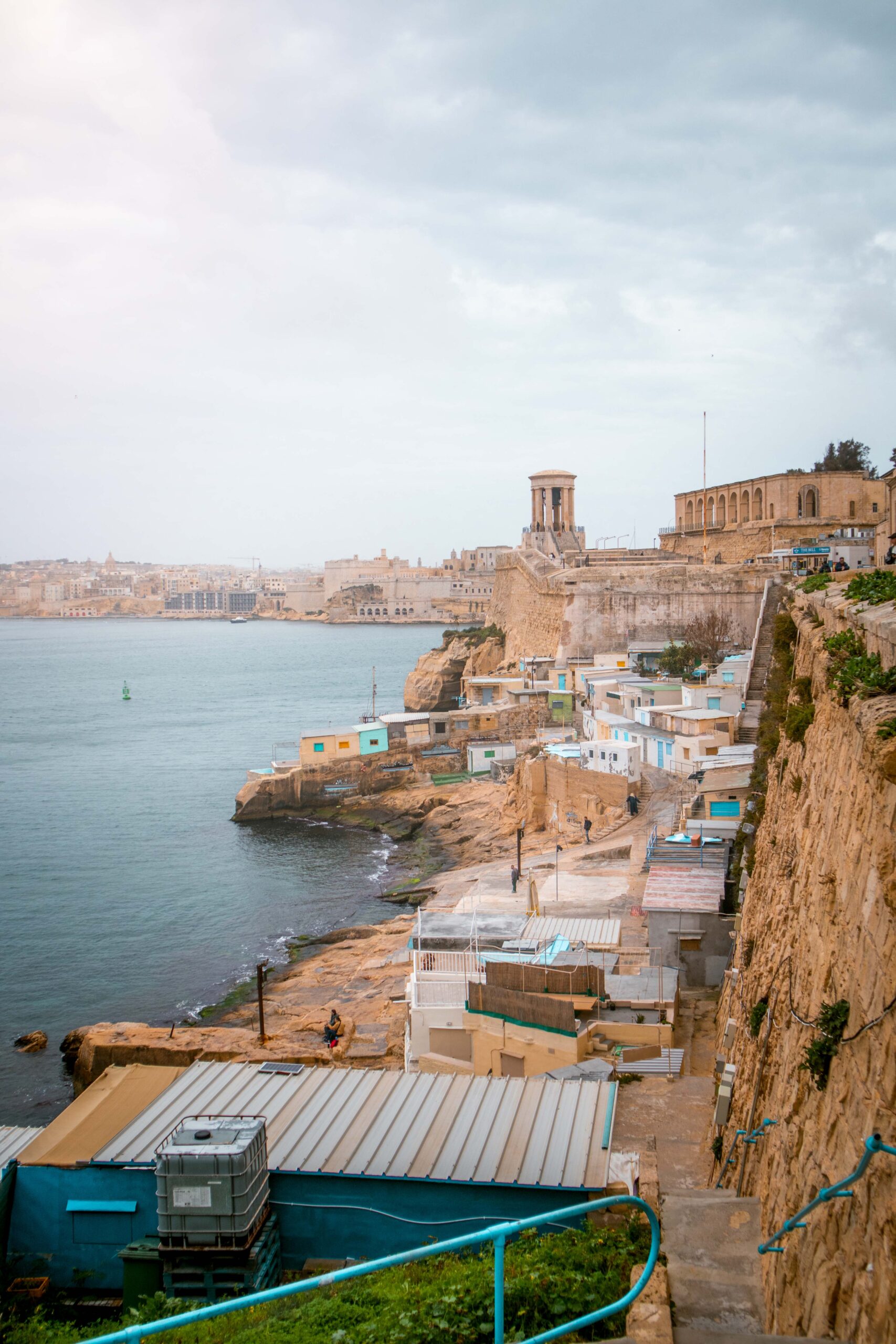 Panoramic view of Wuestenwinds beach and Siege Bell War Memorial in Valletta, Malta