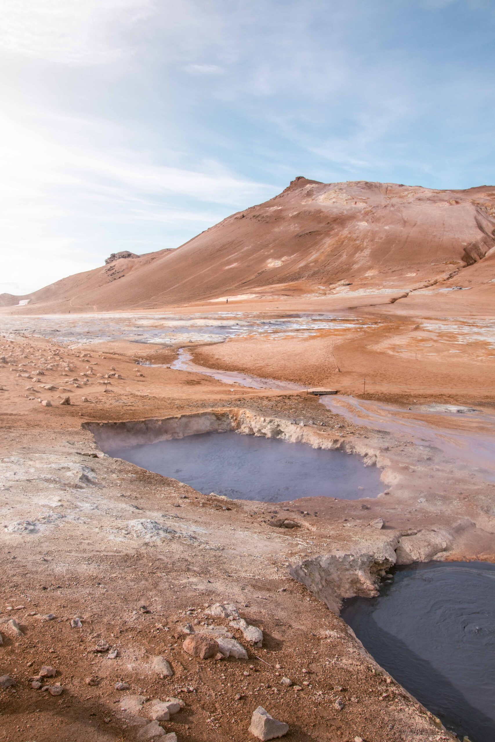 Bubbling hot mud pots in Hverir (Hverarönd) geothermal area and Námafjall ridge near Lake Mývatn, North Iceland