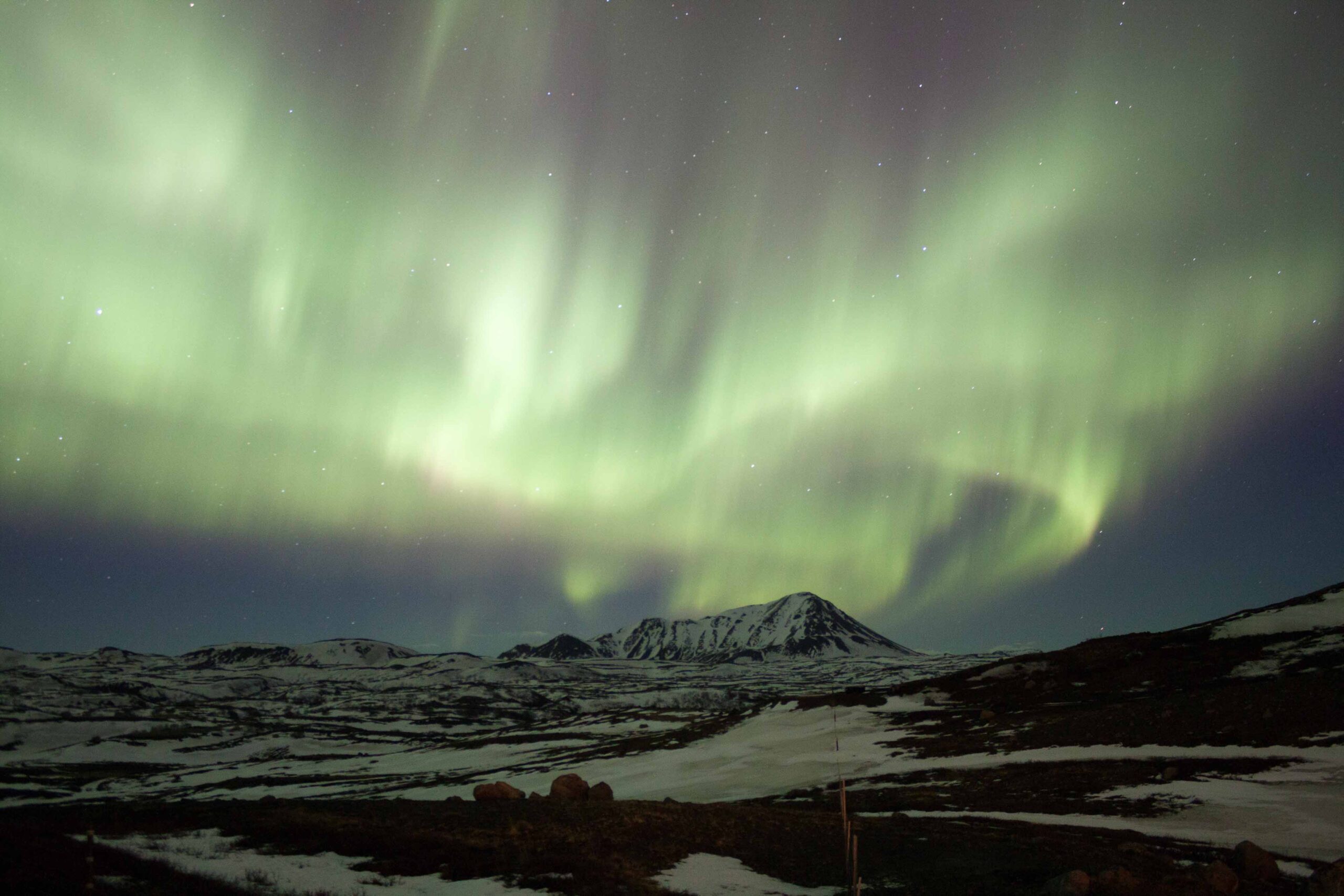 Green northern lights at Lake Mývatn area, North Iceland