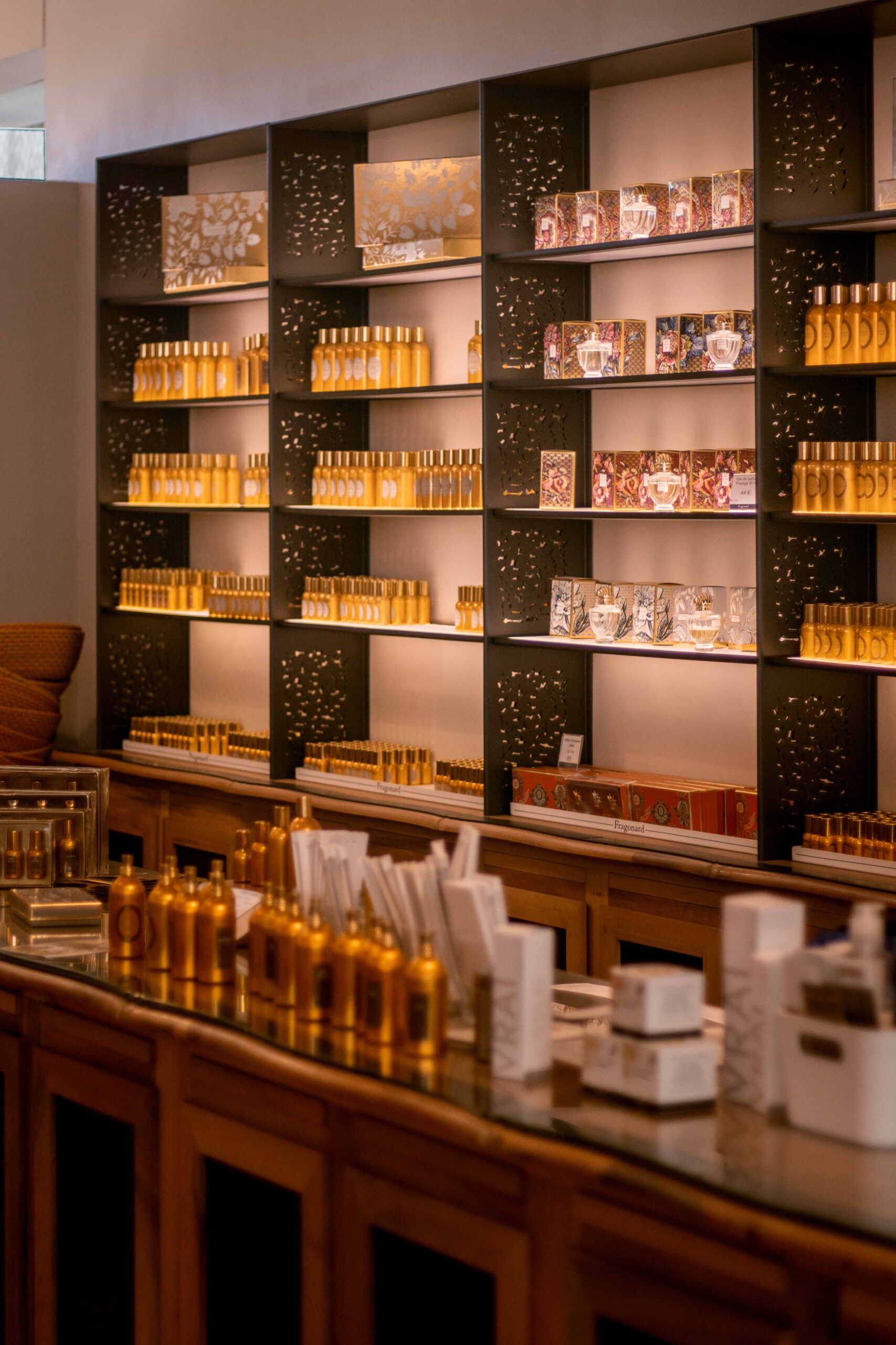 Shelves and displays of perfume bottles in the Fragonard shop in Eze Village, France