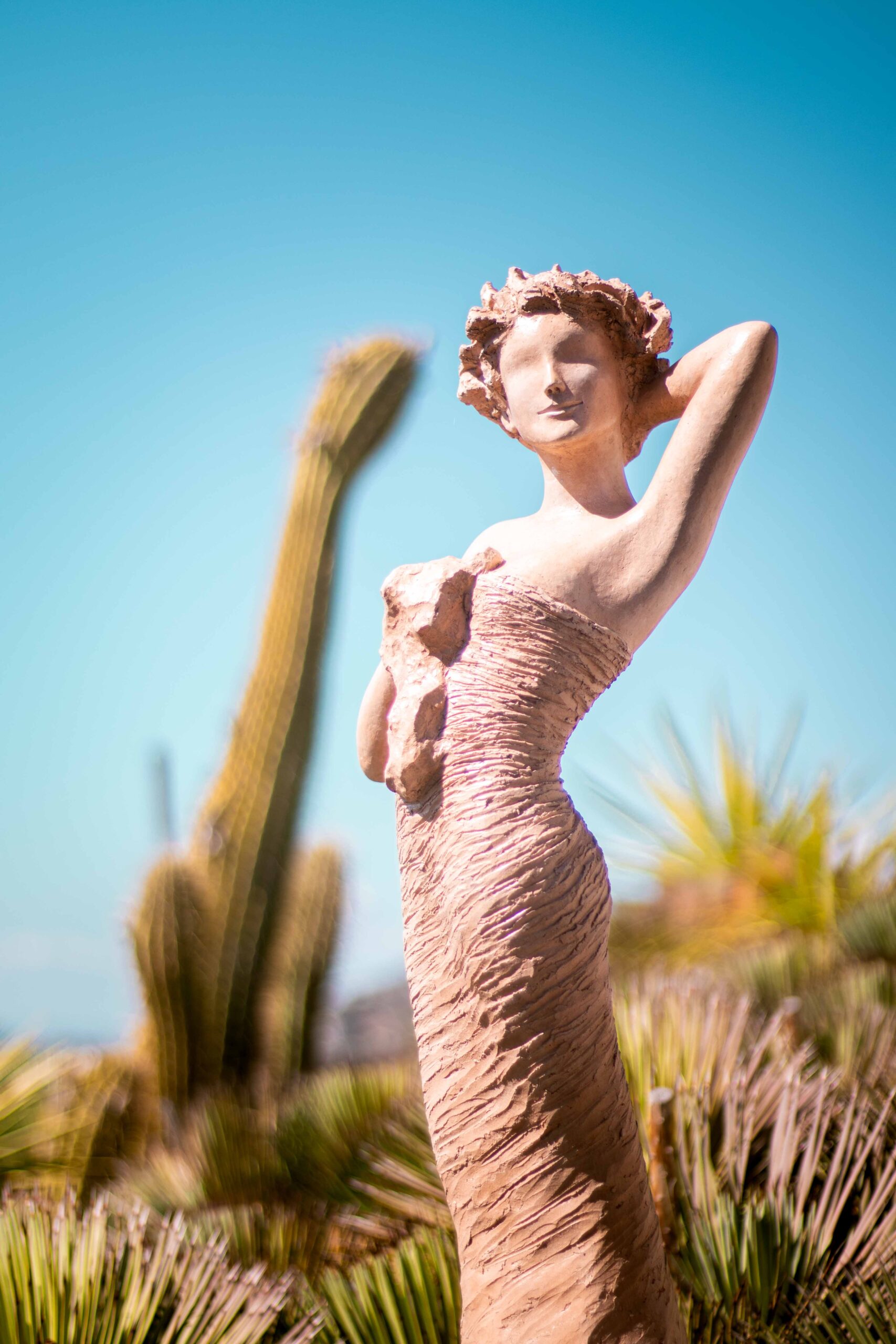 Close-up of a statue made by Jean-Philippe Richard in the Eze Exotic Garden on a sunny day in Eze Village, France