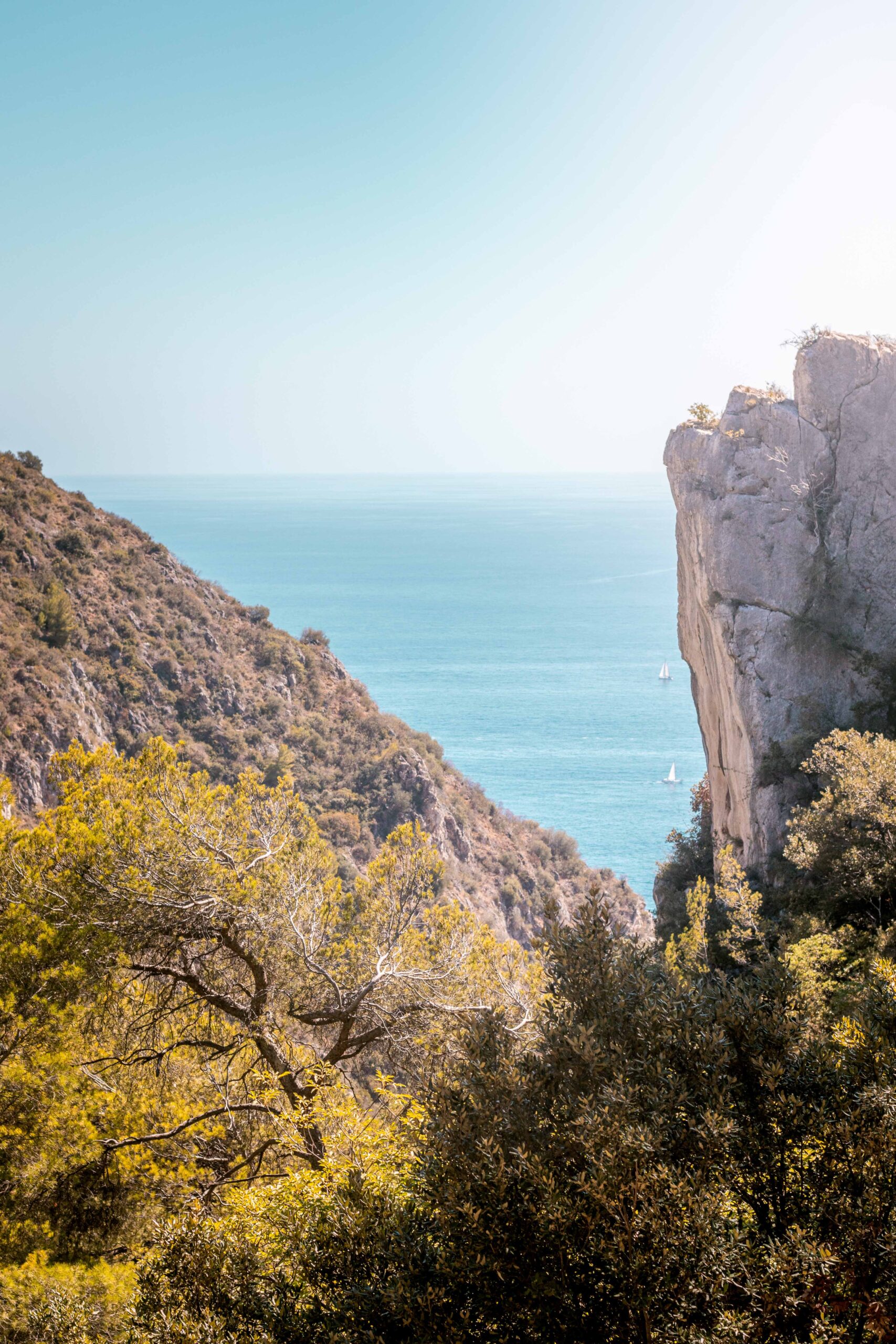 Landscape view of the cliffs, forest and Mediterranean sea as seen from the Sentier de Nietzche hike in Eze, France