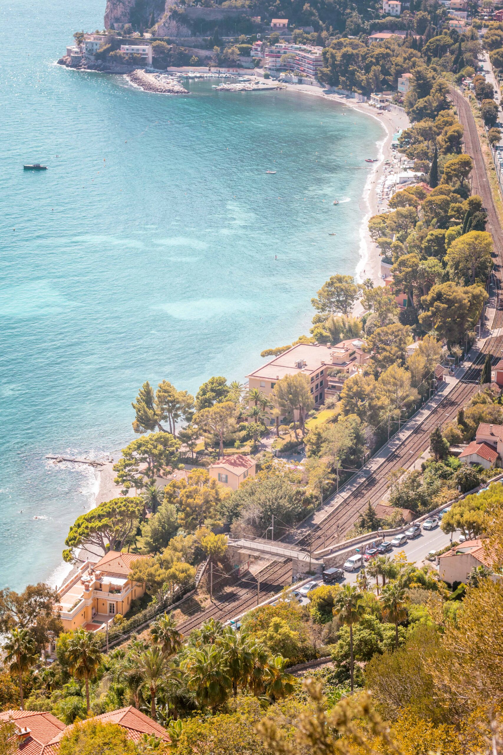 Above view of the beach, the sea and railway as seen from the Sentier de Nietzche hike in Eze, France