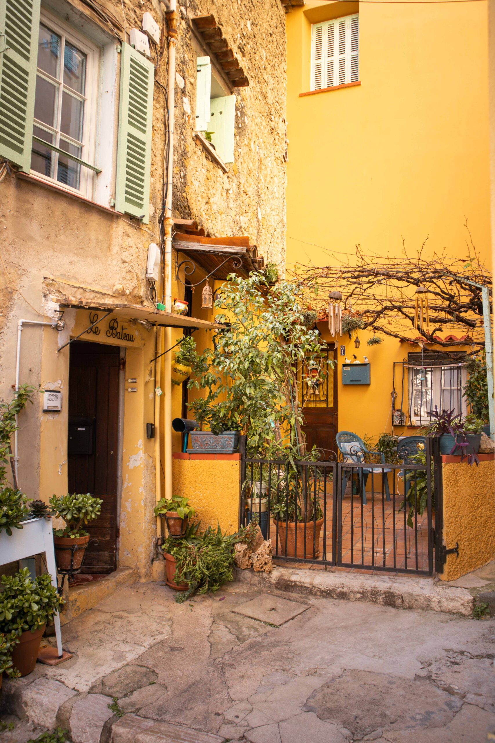 Yellow house front in the Old Town of Menton, France