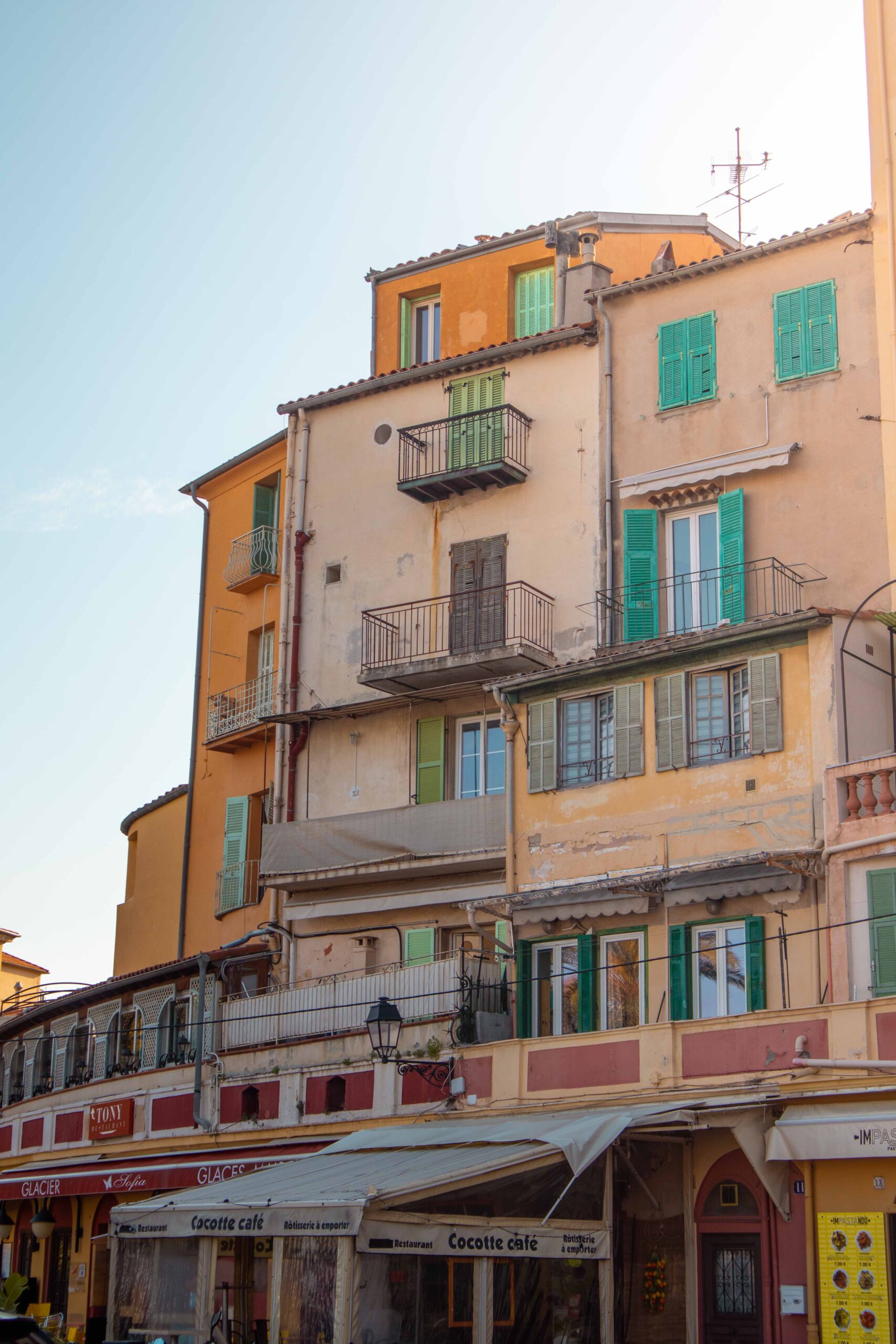 Facade of a building located on the waterfront ("Quai Bonaparte") of Menton, France