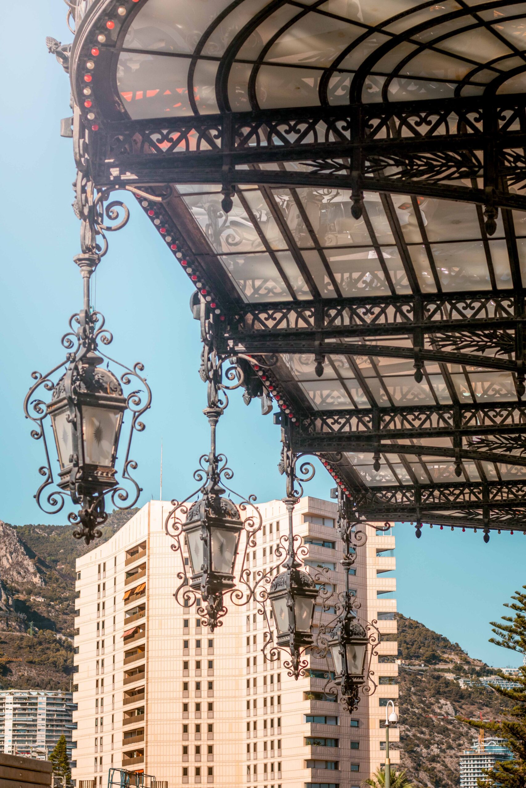 Details of the lamps hanging from the Monte-Carlo Casino during a sunny day in Monaco