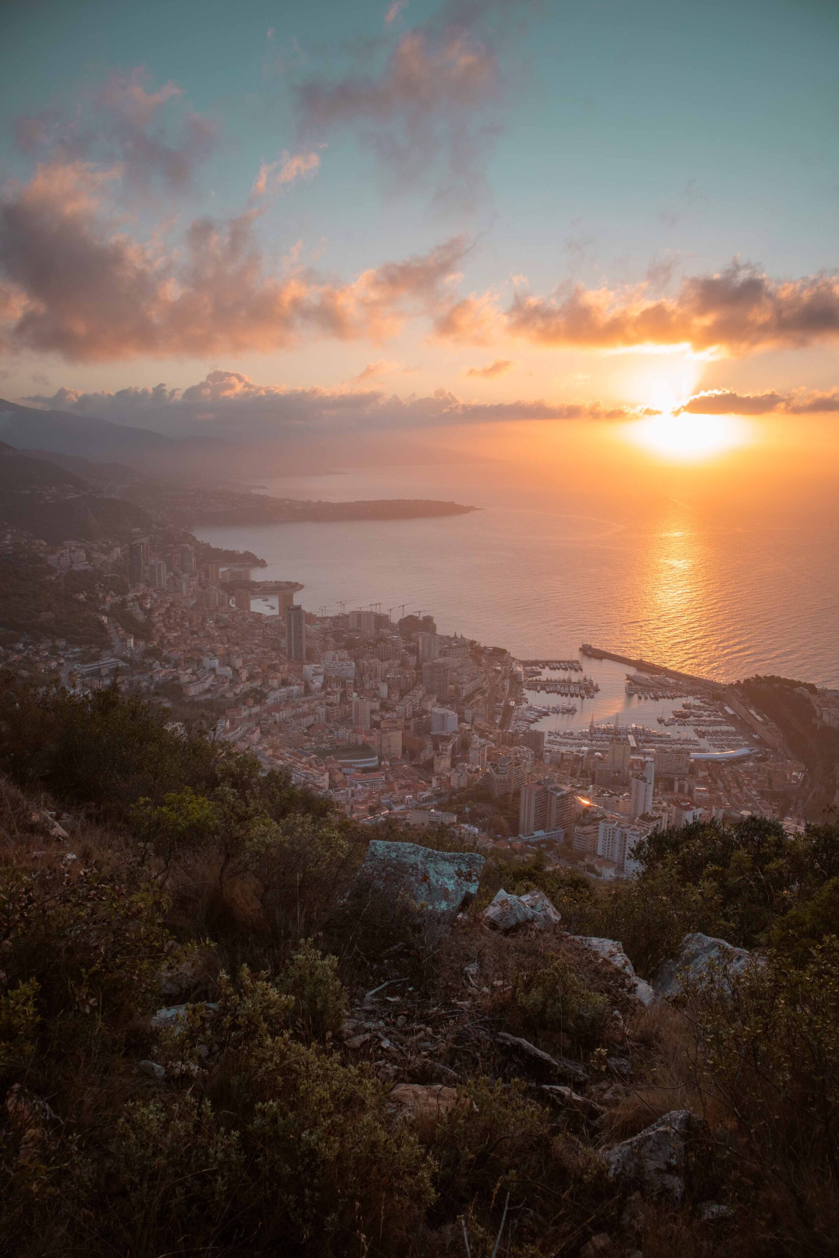 Panoramic view of Monaco at sunrise as seen from the Tête de Chien rock promontory viewpoint near La Turbie Village, France