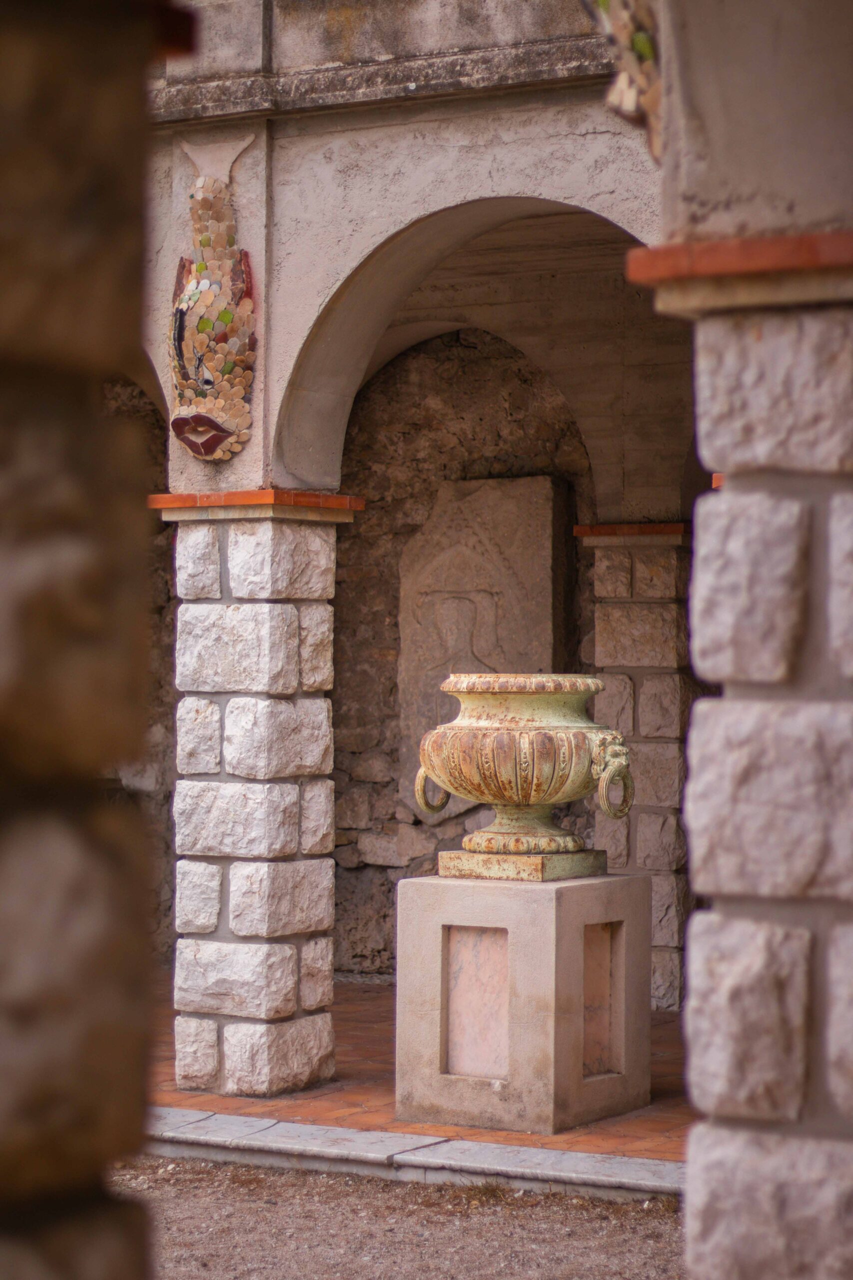 Details of ancient Roman vase and Roman arcades at the Colline du Château (Castle Hill) park in Nice, France
