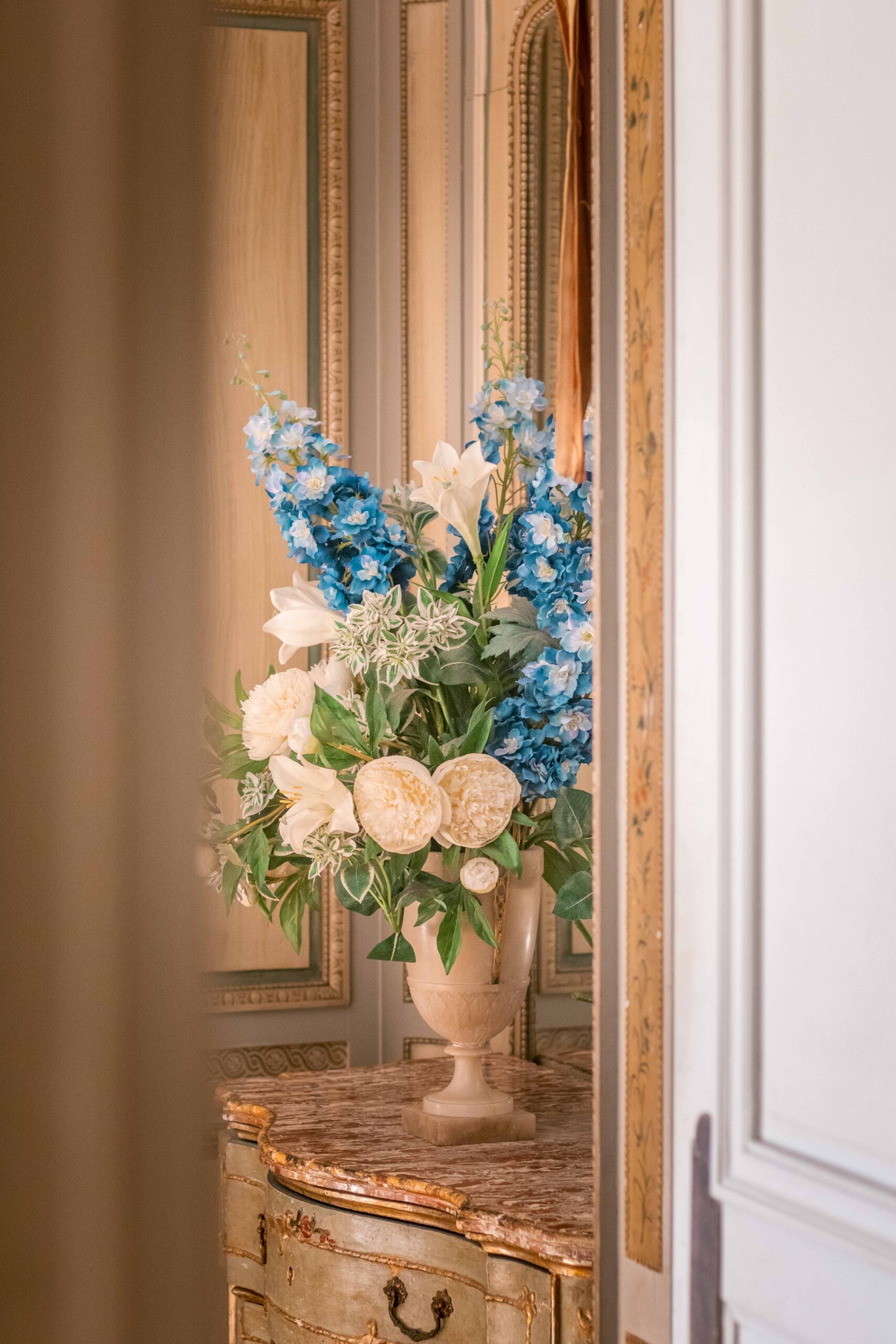 Details of a white and blue flowers bouquet indoor the Villa Ephrussi de Rothschild in Saint-Jean-Cap-Ferrat, France