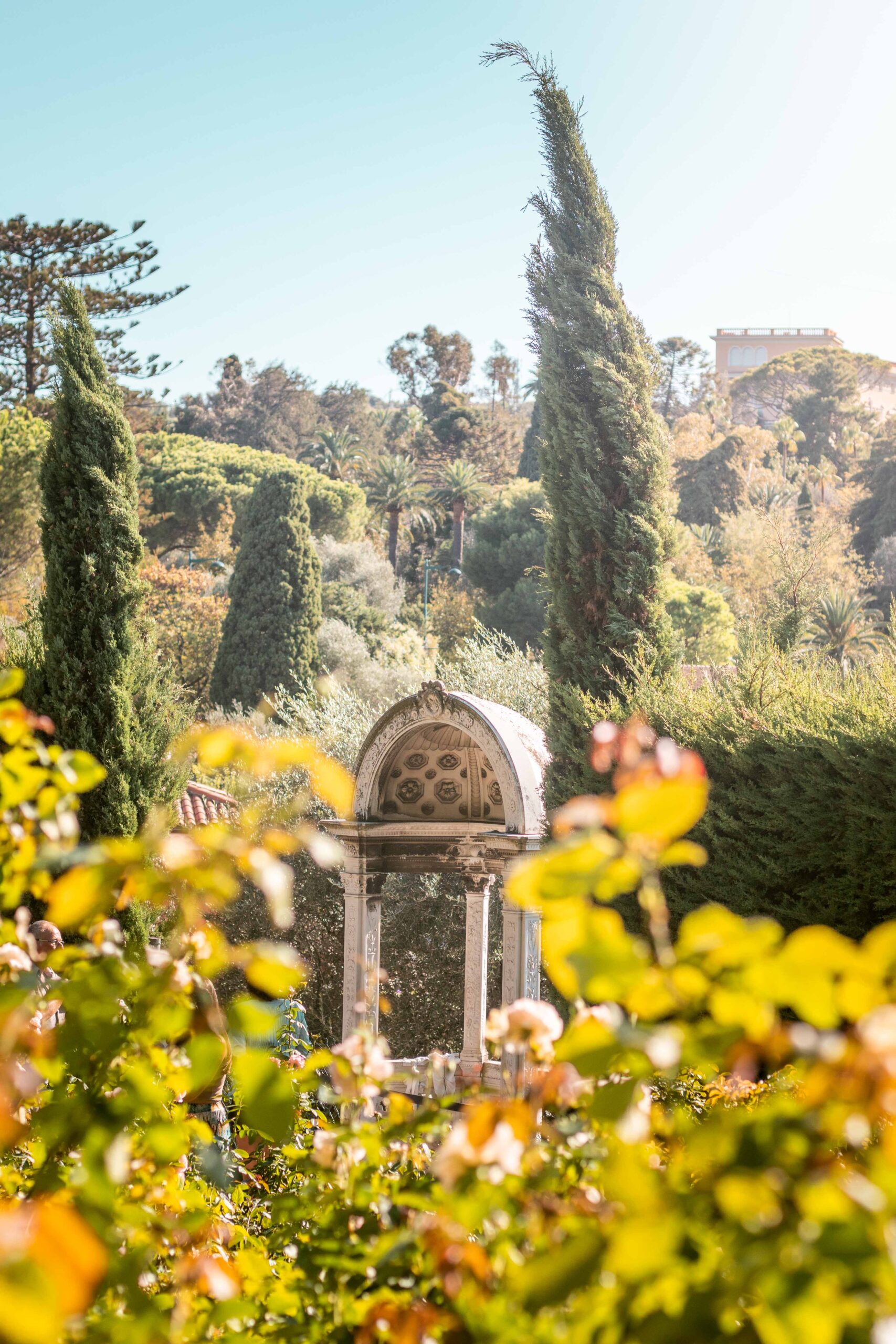 Decorative stone construction and flowers in the Rose Garden ("La Roseraie") of Villa Ephrussi de Rothschild in Saint-Jean-Cap-Ferrat, France