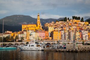 Panoramic view of Menton, France during sunrise - Cover of French riviera itinerary blog article